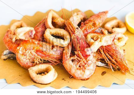 Plate With Roasted Seafood In Sicilian Restaurant