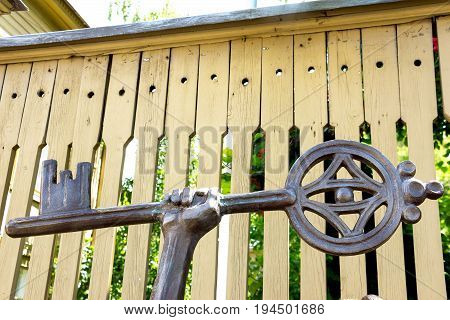 SAMARA, RUSSIA - JUNE 19, 2017: Museum-Estate of the writer A.N. Tolstoy. Bronze statue of Pinocchio. Gold key in Pinocchio's hand close-up