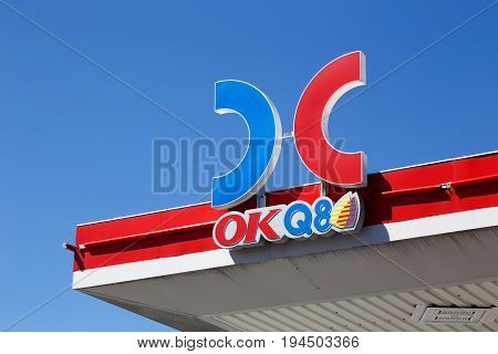 Ornskoldsvik Sweden - June 29 2017: The roof above the gasoline service station OKQ8 with a close-up of the brand name and logo.