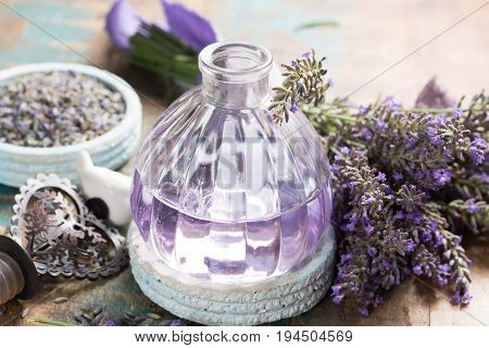 Nature cosmetics handmade preparation of essential oils perfume creams soaps from fresh and dried lavender flowers French artisanal boutique home style