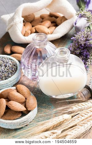 Nature cosmetics handmade preparation of essential oils perfume creams soaps from fresh and dried lavender flowers almond nuts French artisanal boutique home style