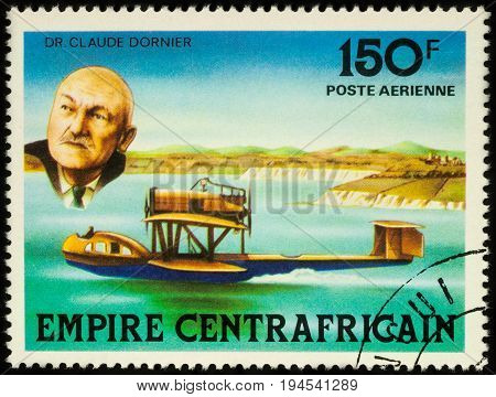 Moscow Russia - July 09 2017: A stamp printed in Central African Empire shows German inventor Claude Dornier and his hydroplane series "Aviation History" circa 1978