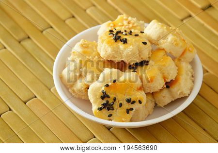 Chinese mini cookies dressing black and white sesame on little cup