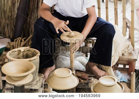 Senior Asian Handcraft Potter Making Clay Pot Earthware By Hand.