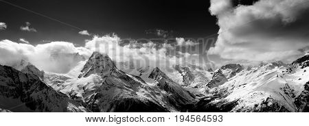 Black And White Panorama Of Snow Mountain At Winter Day
