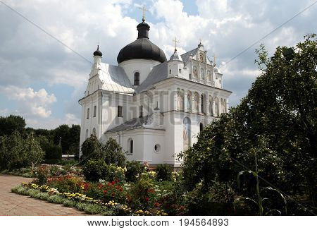 St. Nicholas Monastery Complex, Mogilev, Belarus - August 9, 2014 - Cathedral and the monastery garden in August 9, 2014 in Mogilev, Belarus.