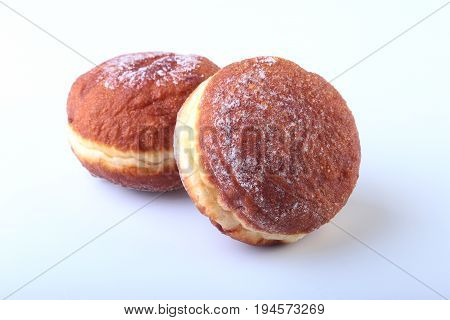 Homemade Doughnuts with Jelly filled and powdered sugar isolated on white background. Selective focus