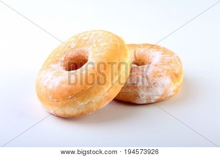 Homemade Doughnuts with Jelly filled and powdered sugar isolated on white background. Selective focus