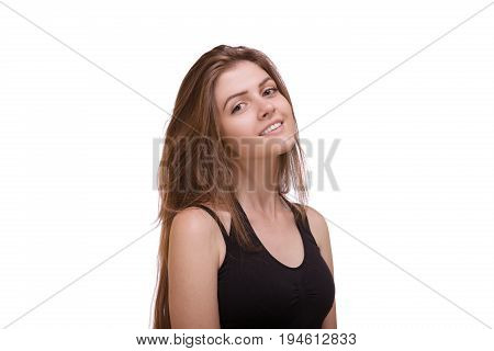Portrait of young sexy woman with long hair posing on white background