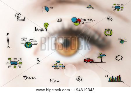 Close up image of human eye through business symbols
