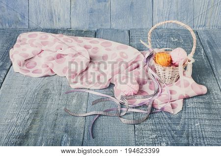 Yarn balls in basket. Knitwork background. Art craft, hand made. Handiwork, sewing and needlework.
