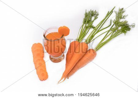 Healthy eating and dieting concept ,fresh carrot and carrot juice or organic healthy juice in glass isolatedbackground with clipping path.