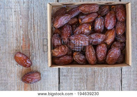 Fresh royal medjool dates in the box. Love for a healthy vegan food concept.