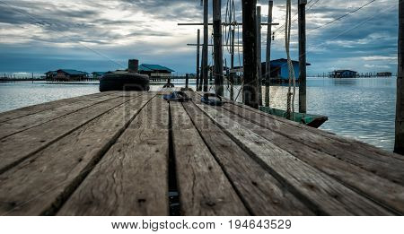 Homestay and floating basket in lake at Kohyo Songkhla Thailand with beautiful sky and clouds. This is traditional fisheries area.