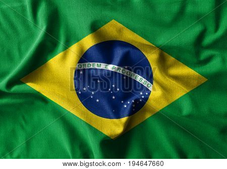 Brazil flag painting on high detail of wave cotton fabrics . 3D illustration .