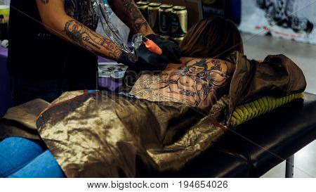 Tattoo Artist Drawing Art On Body