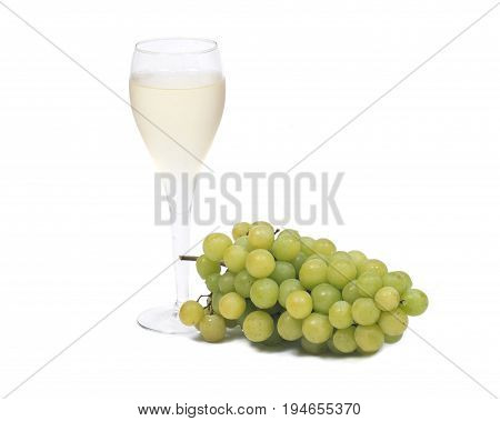 Glass of white wine and ripe organic green grapes isolated on white background