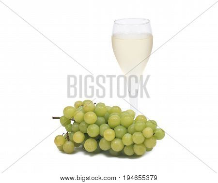 Glass of white wine and ripe organic green grapes isolated on white background