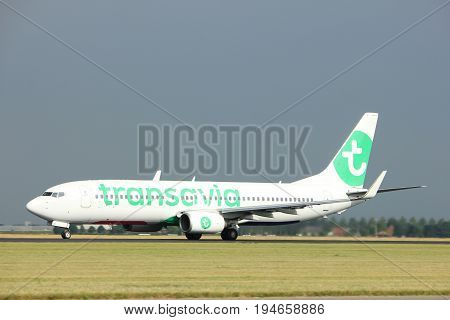 Amsterdam the Netherlands - July 6th 2017: PH-HZE Transavia Boeing 737-800 takeoff from Polderbaan runway Amsterdam Schiphol Airport