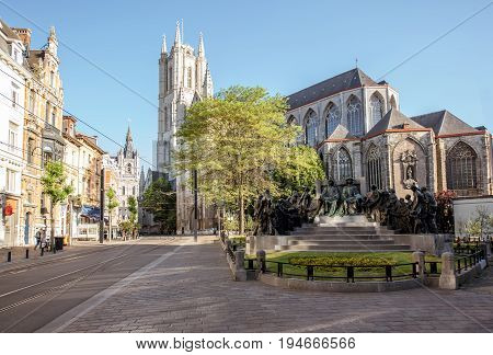 Street view with saint Bavo cathedral during the morning light in Gent city, Belgium