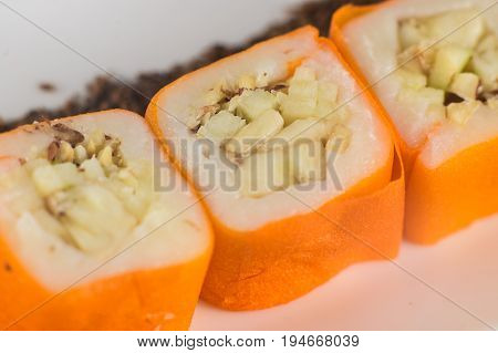 Dessert Maki Sushi - Roll With Various Fruit In Rice Pudding And Coconut Flakes