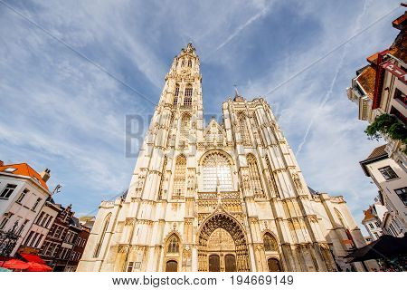 View from below on the Our Lady church in Antwerpen city during the sunset in Belgium