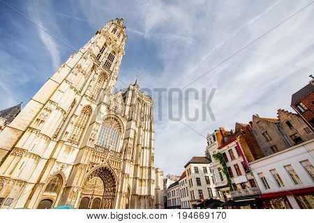 View from below on the Our Lady church in Antwerpen city during the sunset in Belgium