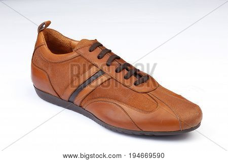 casual male shoe, laced, brown, isolated on white