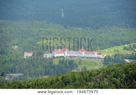 Mount Washington Hotel in summer, from summit of Mount Rosebrook, Bretton Woods, New Hampshire, USA. Now Mount Washington Hotel is registered as a National Historic Landmark.