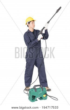 Young Man Stand And Holding High Pressure Water Gun