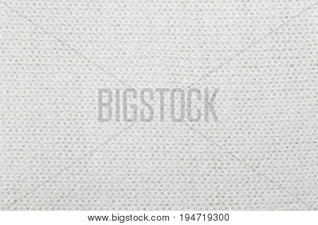 White knitting or knitted fabric texture pattern background. Knitting or knitted. White knitting background. Knitting texture for design.