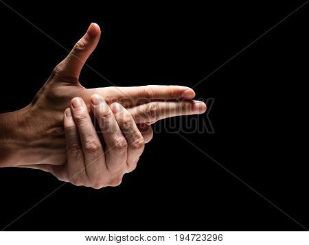 Close up of Male hands on a black background.