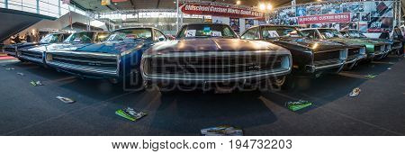 STUTTGART GERMANY - MARCH 17 2016: Various Dodge Charger (Muscle car) modesl 500 and R/T are standing in a row. Panoramic view. Europe's greatest classic car exhibition 