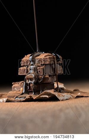 Milk chocolate sprinkled with syrup