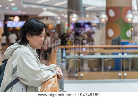 Asian Women 40S White Skin In Shopping Mall