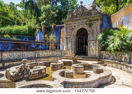 LISBON,PORTUGAL - MAY 17,2017 - Chapel anf fountain in area of Palace Marquesses of Fronteira in Lisbon. Lisbon is the capital of Portugal.