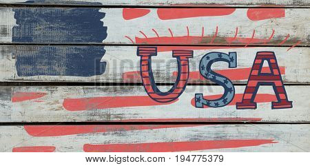 Digitally generated image of USA text against wood background