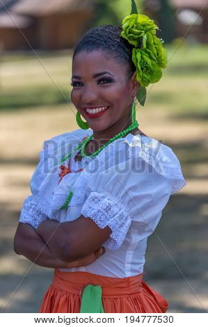 TIMISOARA ROMANIA - JULY 9 2017: Young dancer girl from Puerto Rico in traditional costume present at the international folk festival 