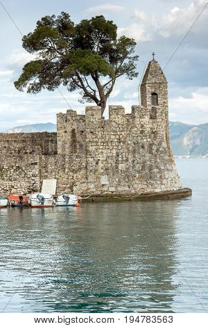 NAFPAKTOS, GREECE - MAY 28, 2015: Sunset panorama of Fortification at the port of Nafpaktos town, Western Greece