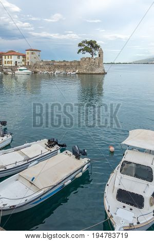 NAFPAKTOS, GREECE - MAY 28, 2015: Sunset panorama of Fortification at the port of Nafpaktos town, Western Greece