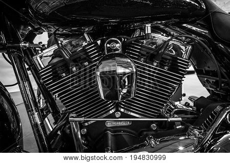 STUTTGART GERMANY - MARCH 17 2016: Fragment of a motorcycle Harley-Davidson Road Glide 2016. Black and white. Europe's greatest classic car exhibition "RETRO CLASSICS"