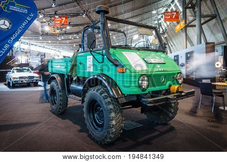 STUTTGART GERMANY - MARCH 18 2016: Multi-purpose auto four-wheel drive medium truck produced by Mercedes-Benz Unimog U600 1980. Europe's greatest classic car exhibition 