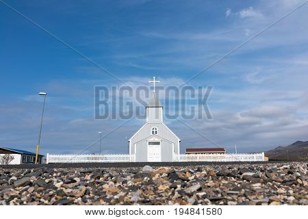 The church stands on the outskirts of the fishing hamlet Bakkagerdi