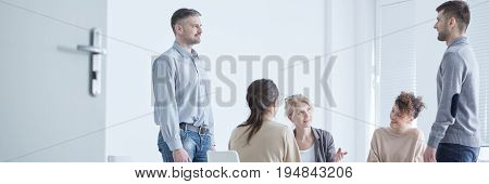 Group therapist using psychodrama in the treatment of neurotic patients