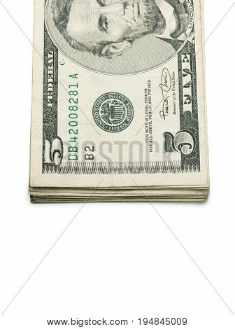 A Stack of Five Dollar Bills on a White Background