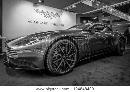 STUTTGART GERMANY - MARCH 18 2016: Grand tourer coupe Aston Martin DB10 2016. Black and white. Europe's greatest classic car exhibition 