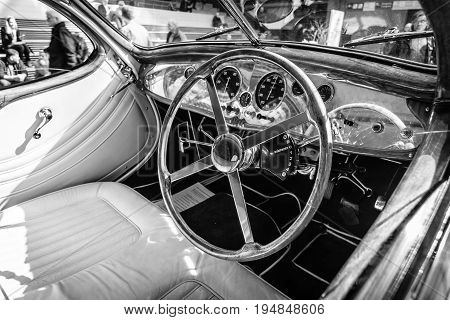 STUTTGART GERMANY - MARCH 18 2016: Cabin of vintage car Talbot-Lago T150 SS Teardrop Coupe 1937. Black and white. Europe's greatest classic car exhibition 