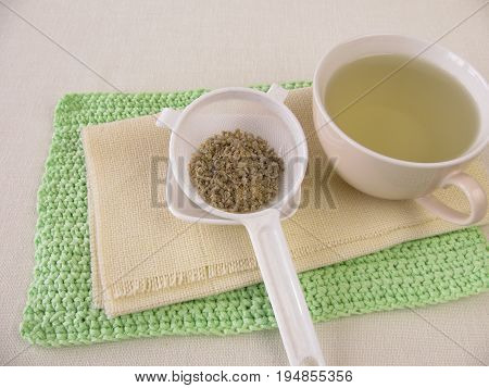 Freshly brewed green coffee from green coffee beans