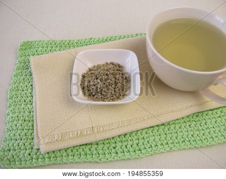 Freshly brewed green coffee from green coffee beans
