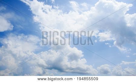 Blue background with clouds very bright beautiful is the most beautiful sky. Can be used as a background.